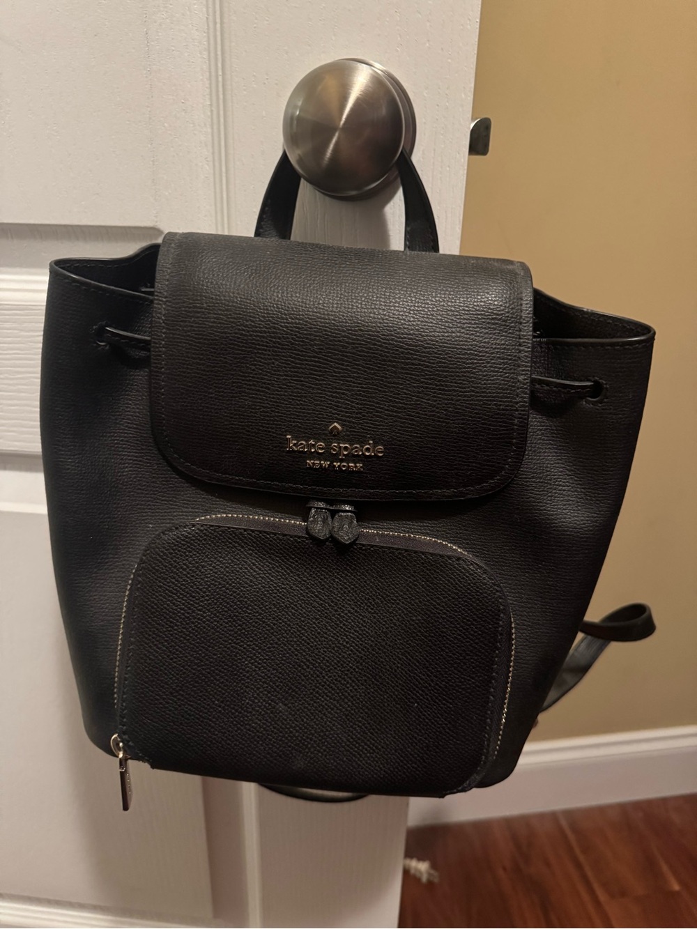 kate spade Black Pebble Leather Drawstring Backpack with Front Pocket and wallet